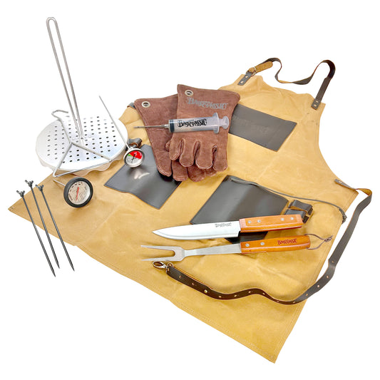 A set of poultry cooking tools including a perforated poultry rack, lift hook, leather gloves, seasoning injector, thermometers, chef's knife, fork, and an apron laid out on a white background.