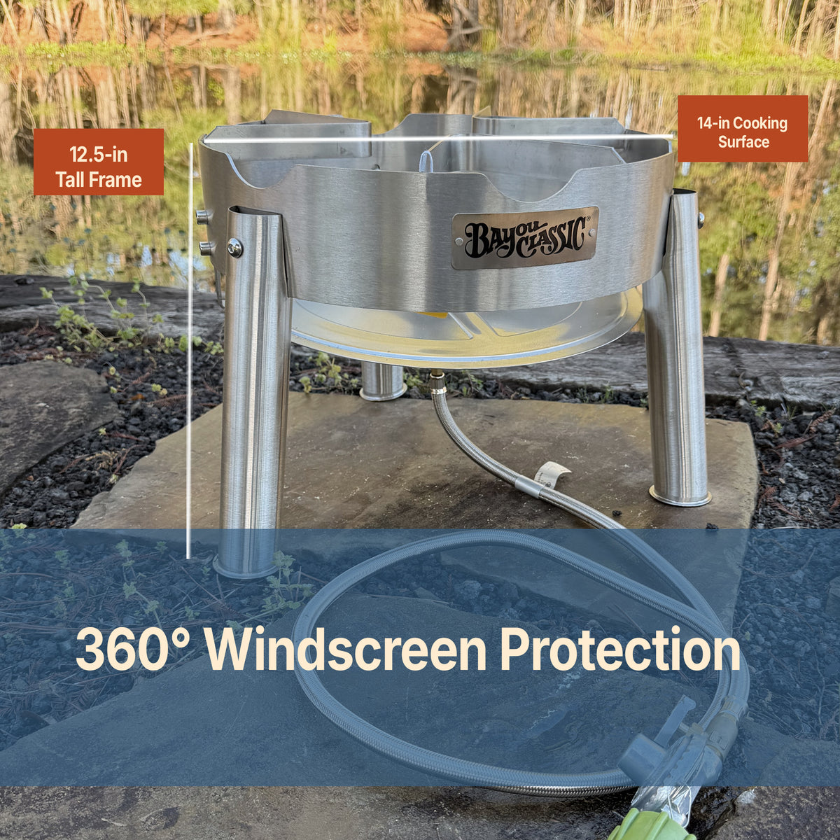 Stainless outdoor cooker with Bayou Classic branding with copy that reads 360-degree windscreen protection, 14-in cooking surface, and 12.5-in tall frame