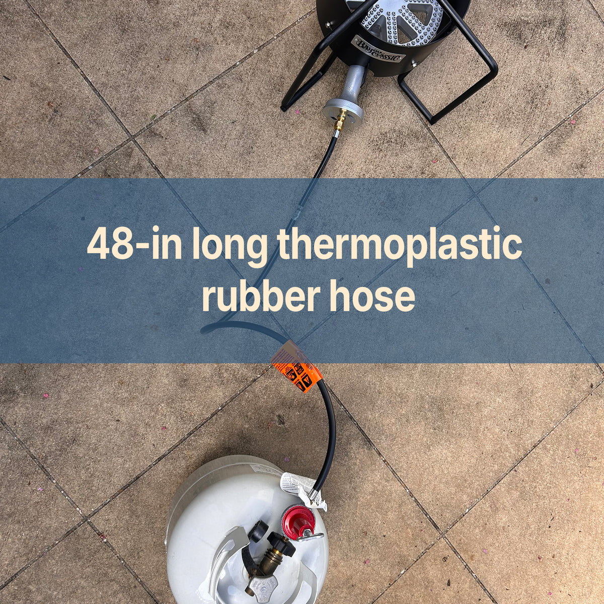 LPG Rubber Hose connecting from cooker to propane tank with text that reads 48-in long thermoplastic rubber hose