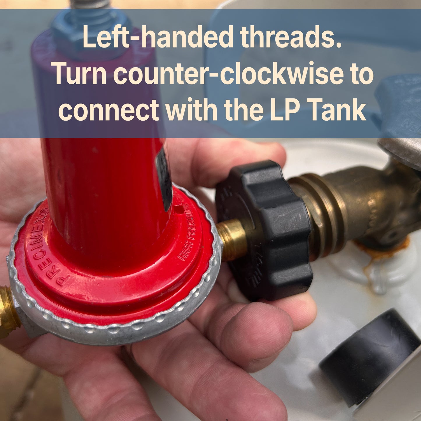 40-PSI red regulator connecting to propane tank with text that reads, left-handed threads. Turn counter-clockwise to connect with the LP tank.