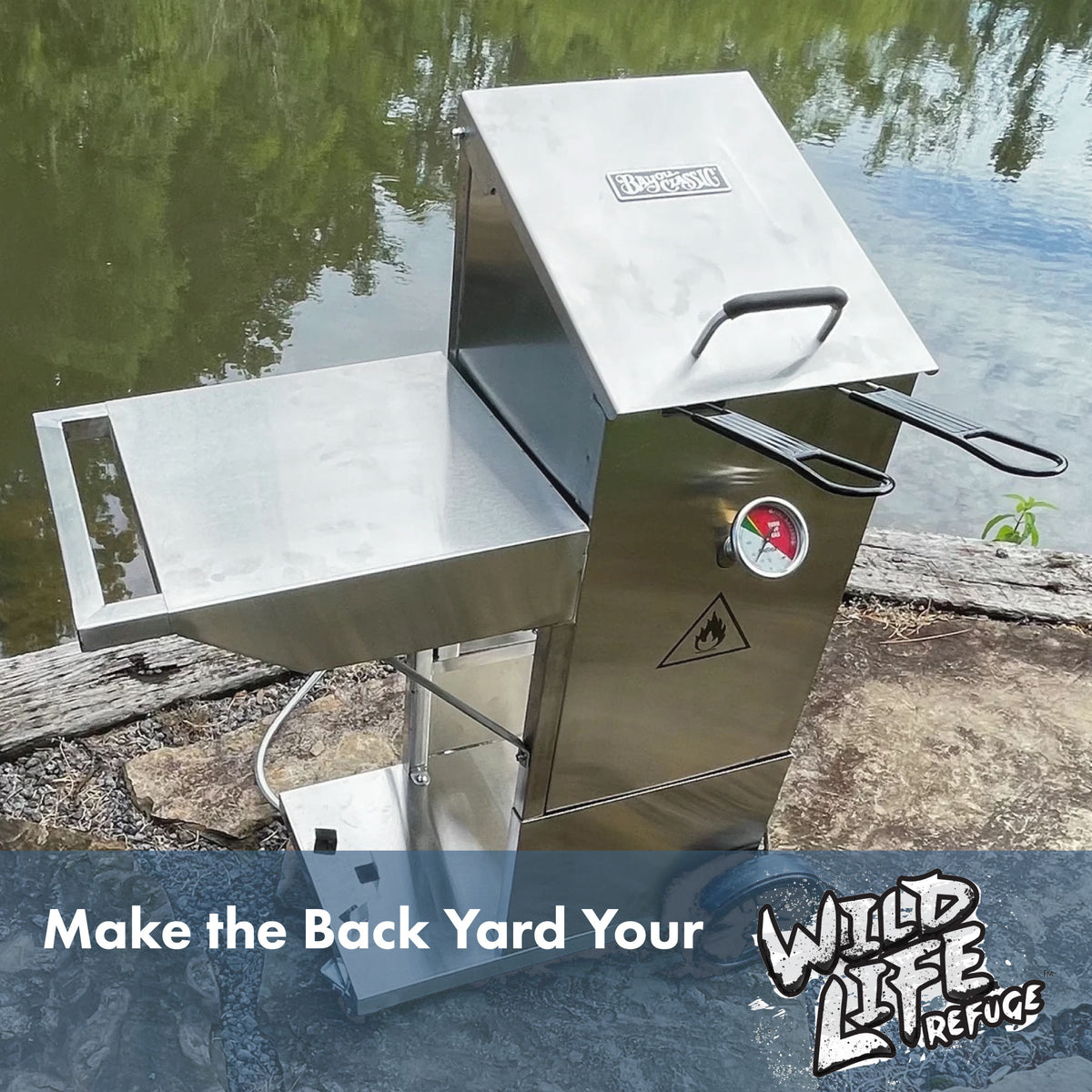 Stainless Bayou Fryer with Cart outside by a body of water and text that reads Make the Back Yard Your Wild Life Refuge