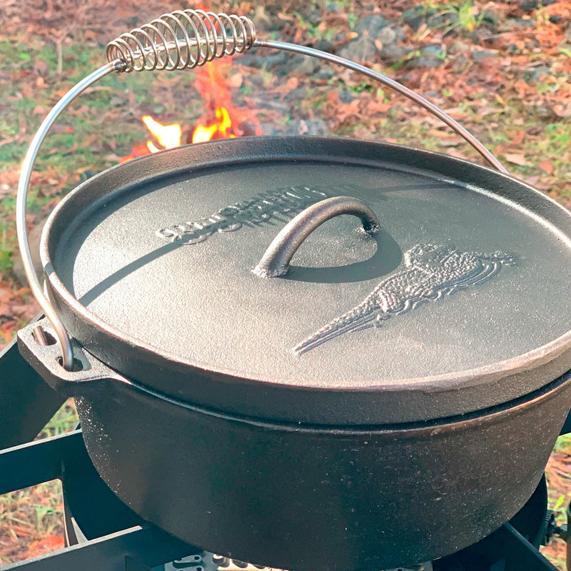 Cast Iron Dutch Oven outside on an outdoor cooker