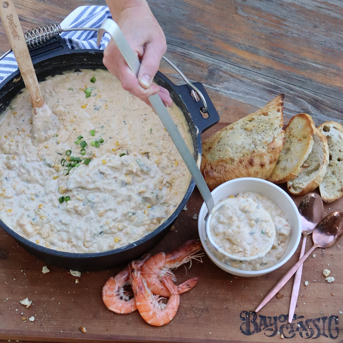 Serving chowder from a cast iron pot