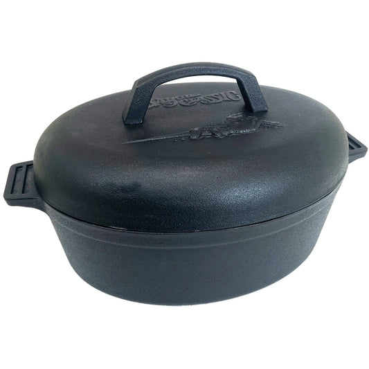 Black cast iron oval roaster with lid on a white background