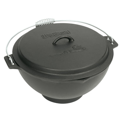 A black cast iron jambalaya kettle with a domed lid and a coil wire handle on a white background