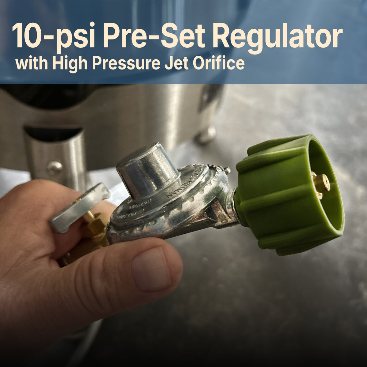 Close-up of regulator with green knob and text that reads 10-psi Pre-Set Regulator with High Pressure Jet Orifice