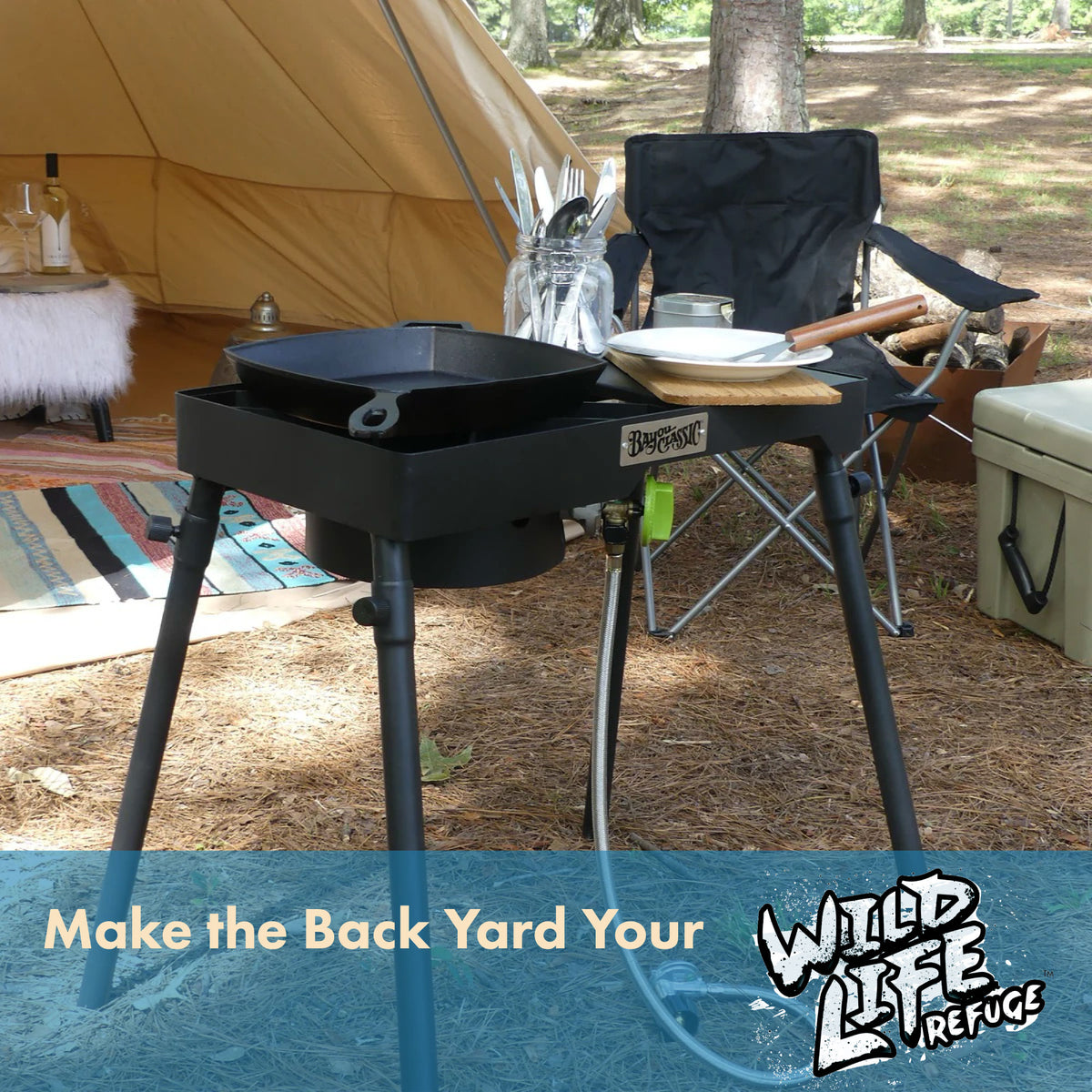 Outdoor camping setup with portable stove, chair, and tent in a backyard setting with text that reads Make the Back Yard Your Wild Life Refuge