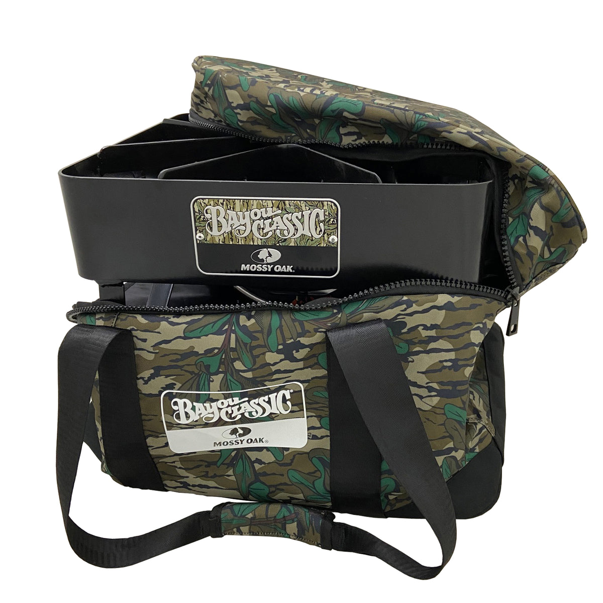 A camouflage Mossy Oak Gear Bag containing an outdoor cooker on a white background