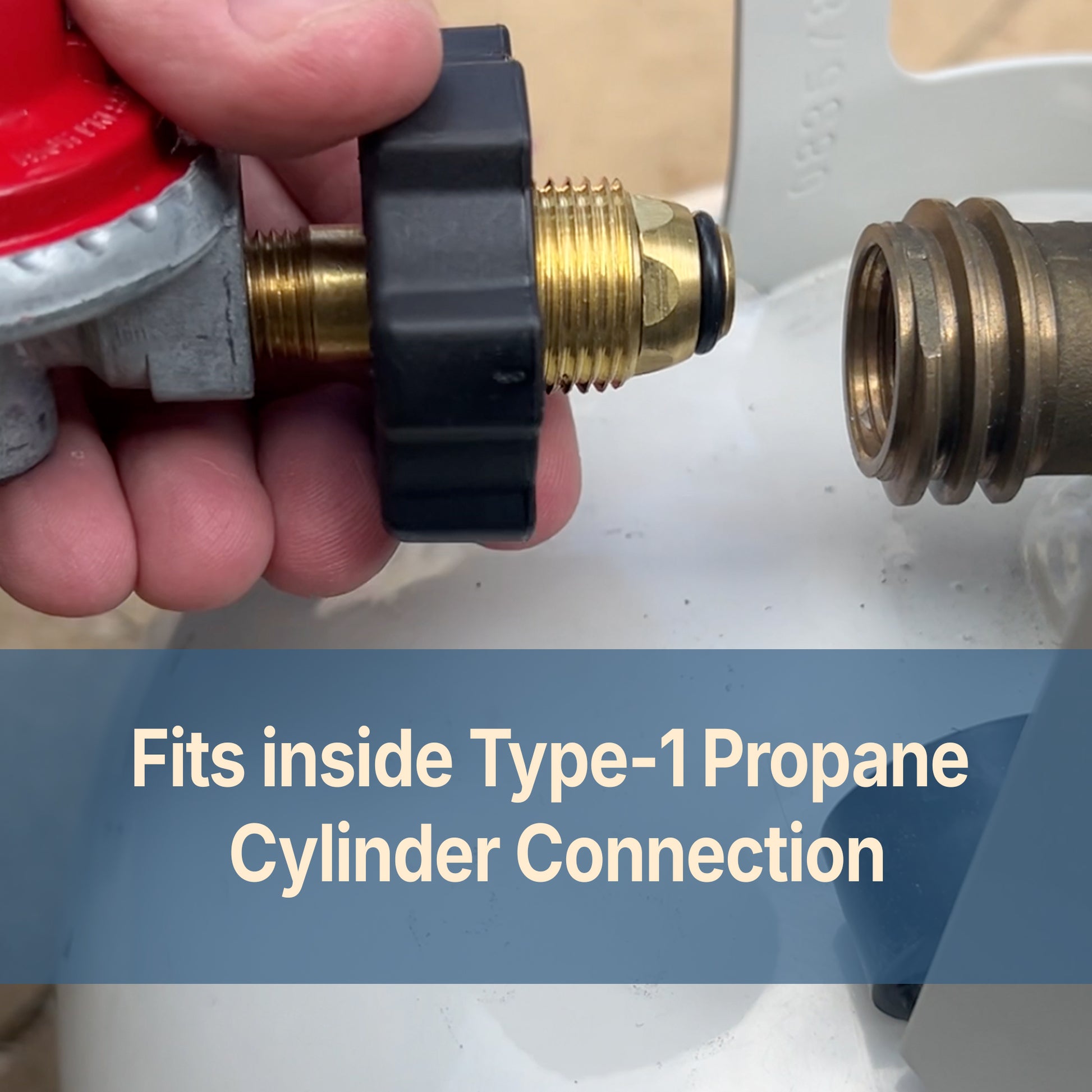 Person holding end of 40-PSI regulator to the propane tank with text that reads, Fits inside Type-1 Propane Cylinder Connection