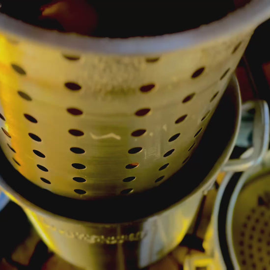 Video lowering basket into pot on a cooker